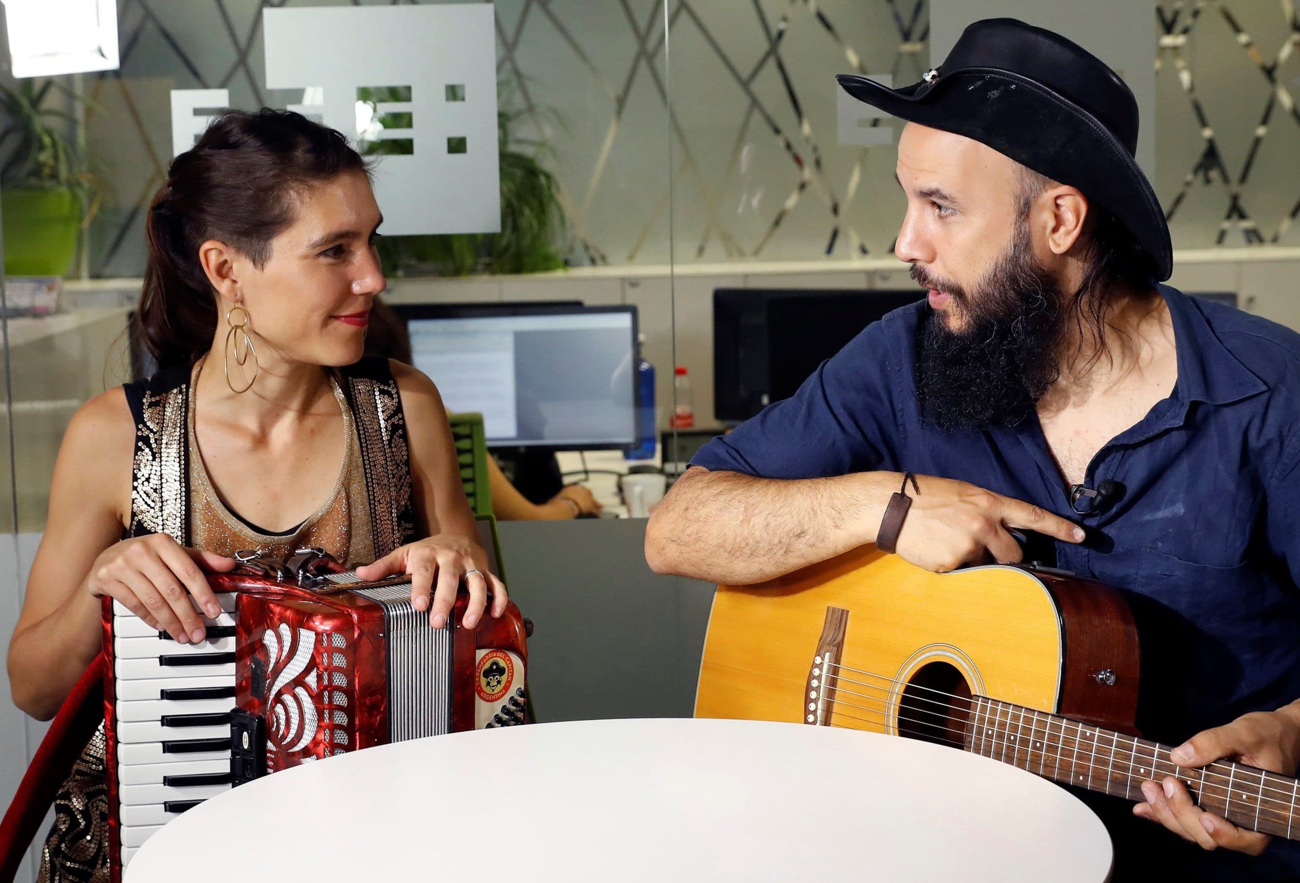 Victoria Cornejo (L) and Jero Capitan (R) of La Fanfarria del Capitan band from Argentina pose for the photographers during an interview to Spanish News Agency EFE held in Madrid, Spain, 25 July 2019. The song of the group 'Bella Ciao' was performed in the Spanish serie 'La Casa de Papel'. EFE/ Ballesteros//EFE_20190725-636996818165787132/1907252016/Credit:Ballesteros/EFE/SIPA/1907252016