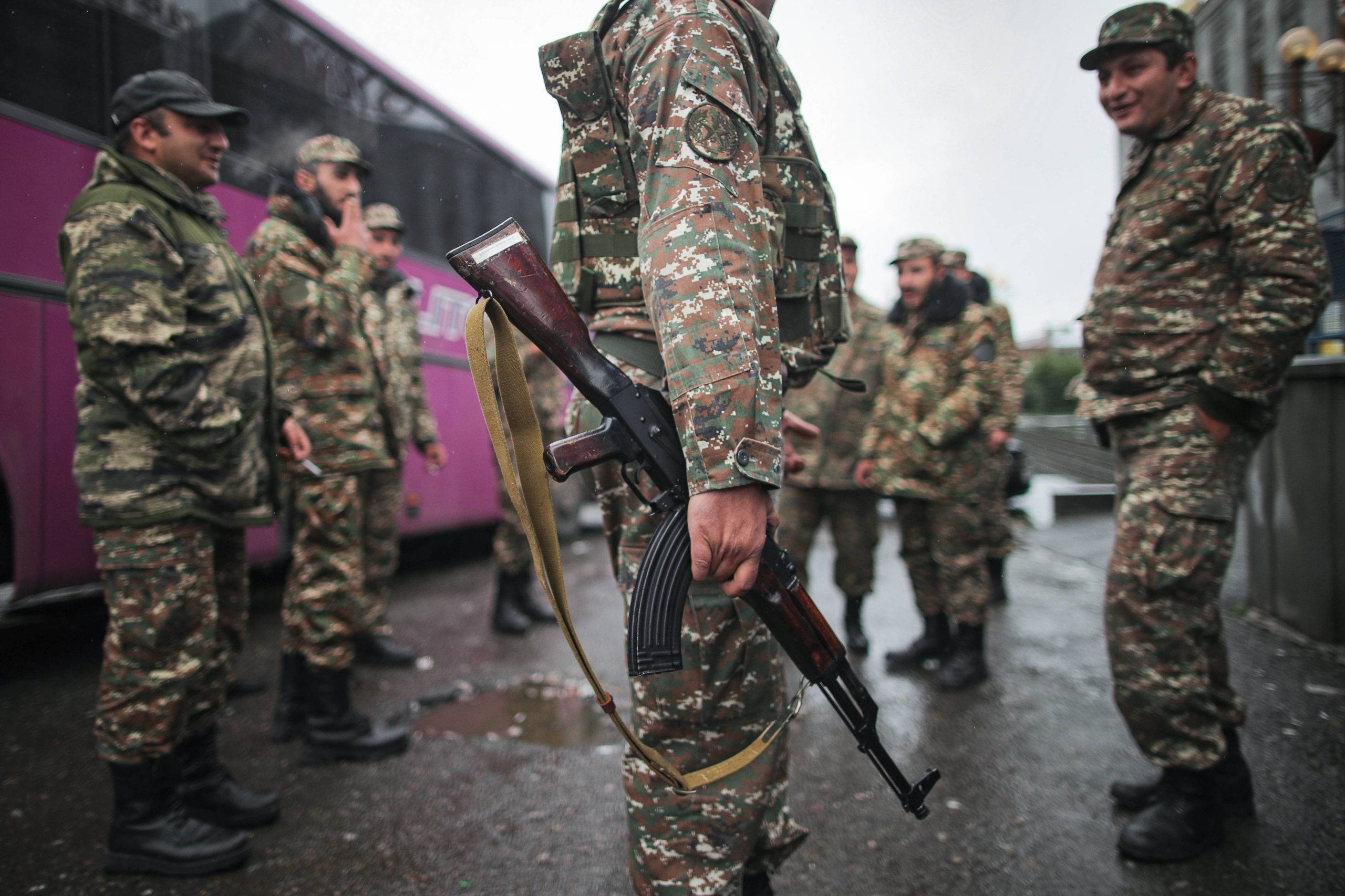 ARMENIA - OCTOBER 6, 2020: Volunteers and mobilized military personnel stand by a bus ahead of being deployed to the front line. Sergei Bobylev/TASS/Sipa USA/31023810/MB/2010061150
