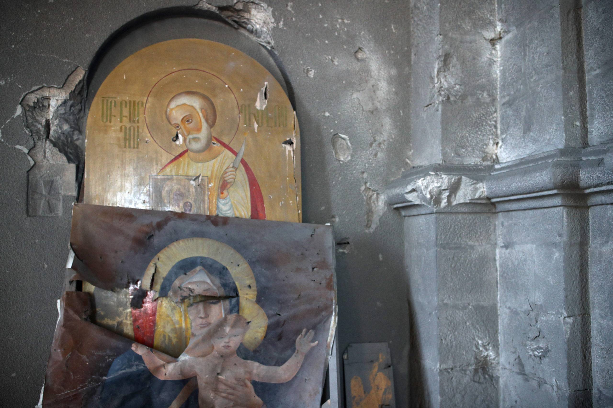 SHUSHA, NAGORNO-KARABAKH - OCTOBER 18, 2020: Icons at Holy Savior (Ghazanchetsots) Cathedral damaged in a rocket attack by the Azerbaijani Armed Forces. The fighting between Armenia and Azerbaijan over the disputed Caucasus Mountains territory of Nagorno-Karabakh resumed in late September. Both countries accused each other of provocation, declared martial law, and mobilized their armed forces. In the night of October 16, the capital city of Nagorno-Karabakh, Stepanakert, and the Azerbaijani city of Ganja underwent military attacks with multiple casualties and injuries reported from both sides. Sergei Bobylev/TASS/Sipa USA/31150712/YD/2010181801