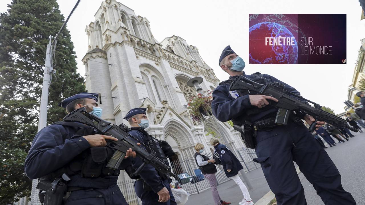 French police officers stand near Notre Dame church in Nice, southern France, Thursday, Oct. 29, 2020. French President Emmanuel Macron has announced that he will more than double number of soldiers deployed to protect against attacks to 7,000 after three people were killed at a church Thursday. (Eric Gaillard/Pool via AP)/NIC124/20303545924959/83552291/2010291600