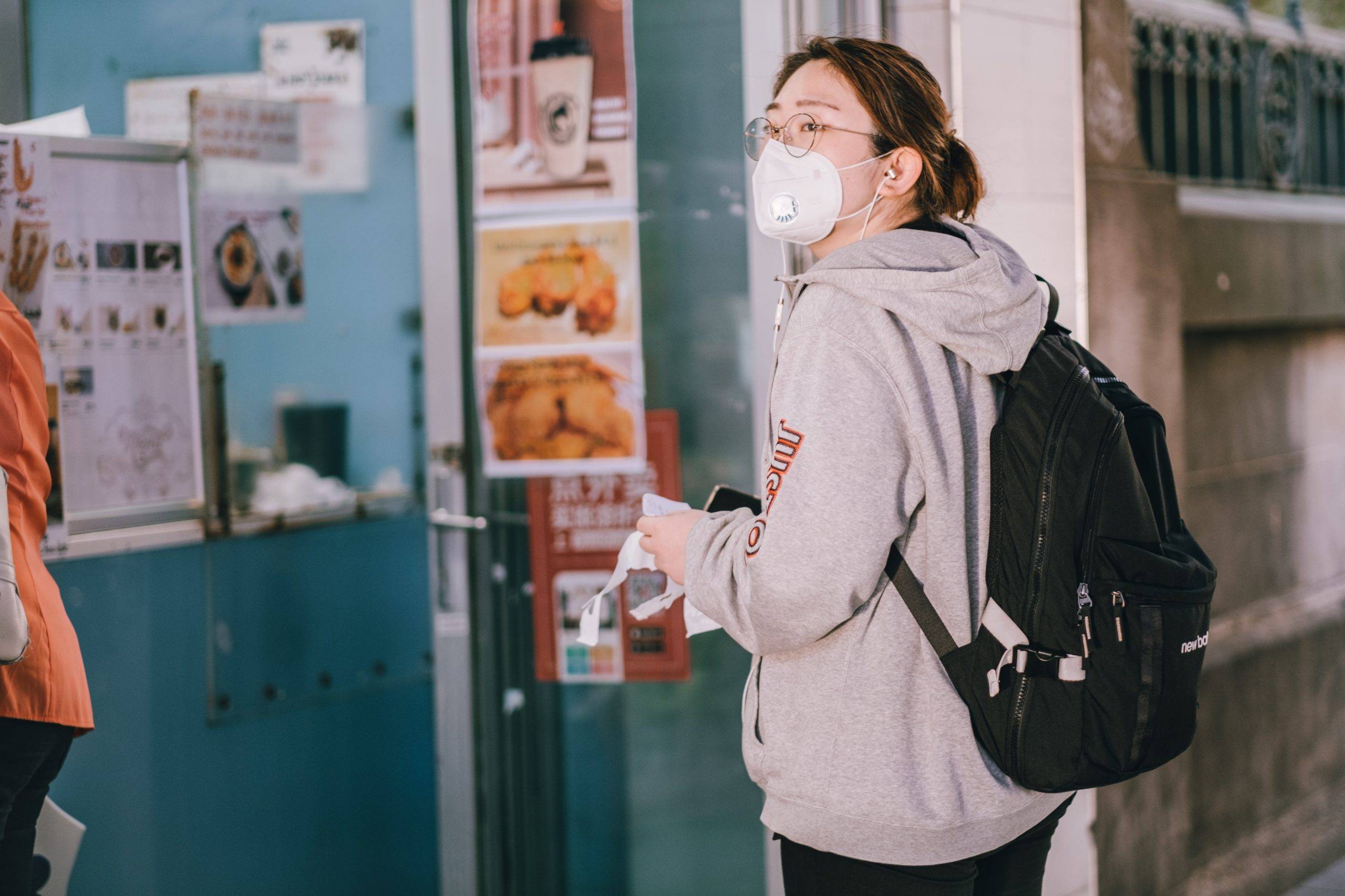 Femme portant un masque en Australie (c) Unsplash