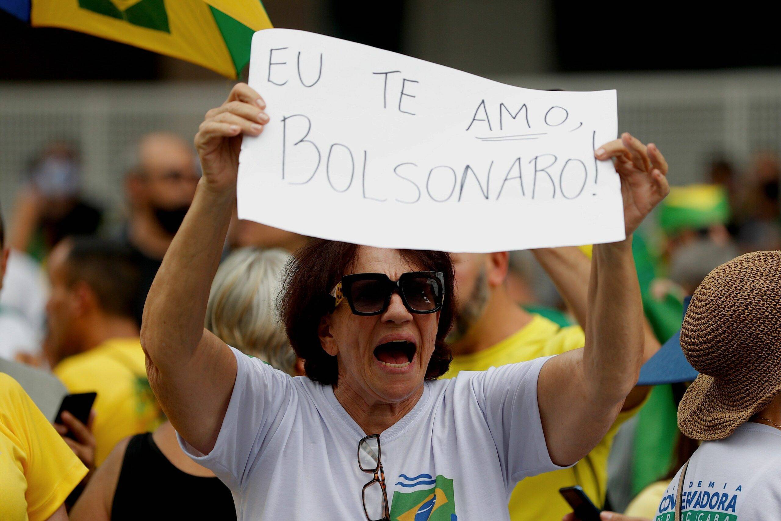 Demonstrators protest against the closure of businesses due to the pandemic in Sao Paulo, Brazil 14 MArch 2021. Followers of the Brazilian president, Jair Bolsonaro, protested this Sunday in the main cities of the country, such as Sao Paulo, Rio de Janeiro, Brasilia and Belo Horizonte, against the restrictive measures imposed by regional governments to stop the COVID pandemic. EFE/Fernando Bizerra Jr//EFE_20210314-637513560142231313/2103142236/Credit:Fernando Bizerra Jr/EFE/SIPA/2103142239