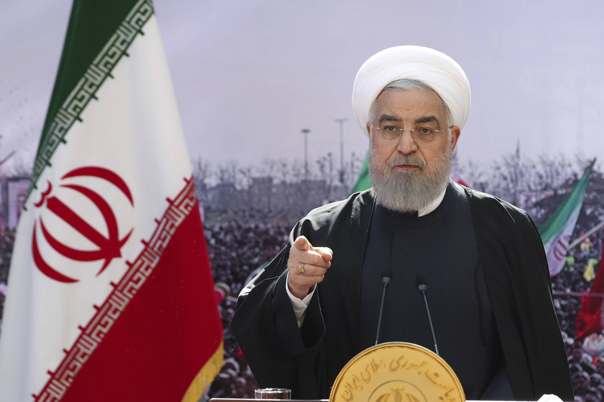 In this photo released by the official website of the office of the Iranian Presidency, President Hassan Rouhani addresses the nation in a televised speech in Tehran, Iran, Wednesday, Feb. 10, 2021. Rouhani said the West has no way except reaching an agreement with Tehran for restoring 2015 nuclear deal as the nation marked the anniversary of the country's 1979 Islamic Revolution on Wednesday on wheels - cars, motorcycles, bicycles - instead of traditional rallies and marches because of the region's worst outbreak of the coronavirus. (Iranian Presidency Office via AP)/VAH101/21041337635133/AP PROVIDES ACCESS TO THIS PUBLICLY DISTRIBUTED HANDOUT PHOTO PROVIDED BY IRANIAN PRESIDENCY OFFICE. MANDATORY CREDIT./2102101030