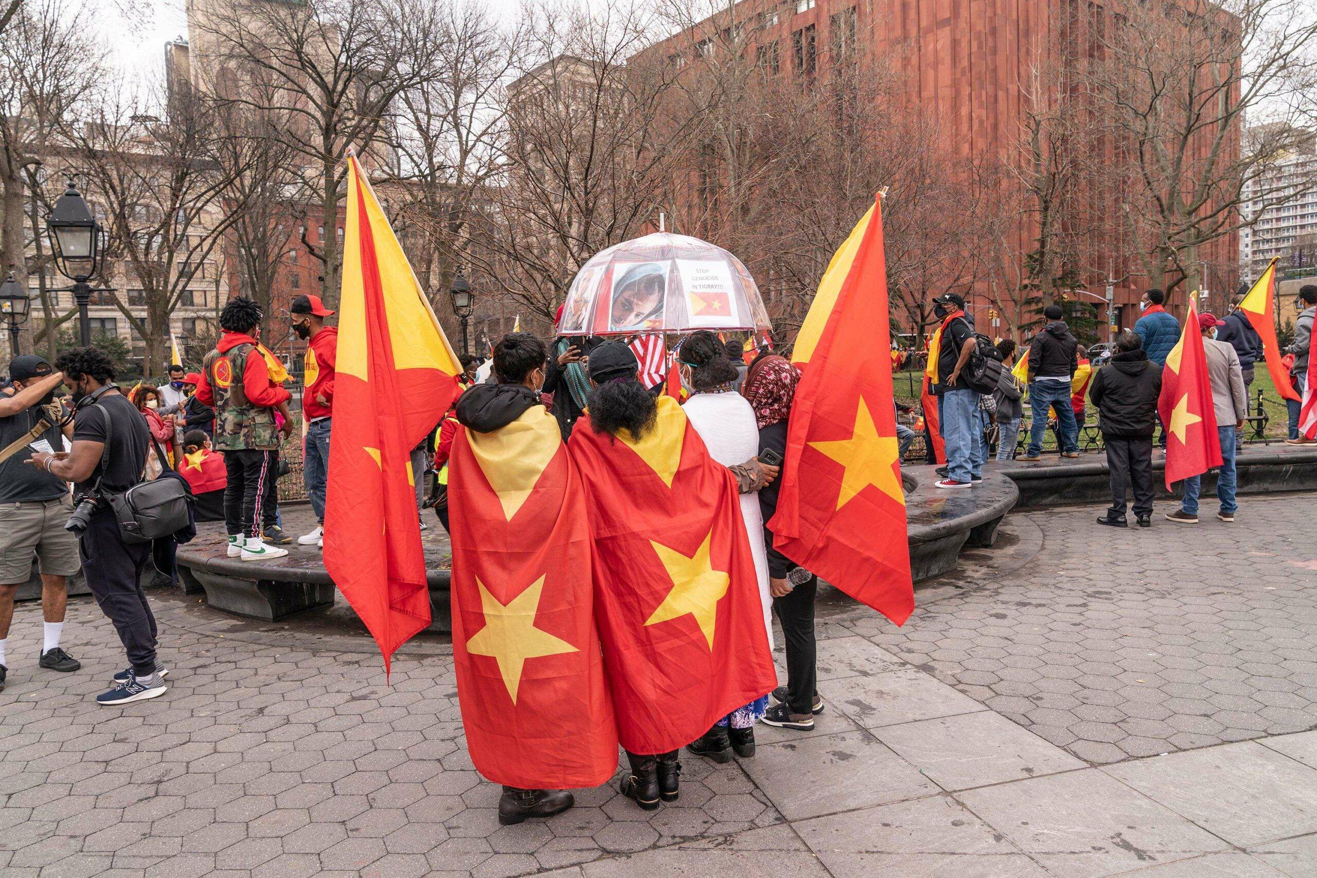 Mandatory Credit: Photo by Lev Radin/Pacific Press/Shutterstock (11833717g)
Protesters with Tigray flags and posters staged rally on Washington Square and walk along Broadway demanding end of Ethiopia offence on civilians. Conflict between Tigray Regional Government and Ethiopian Government started in 2019 and escalated into an open war on November 4, 2020. More than 2.3 million children are cut off from desperately needed aid and humanitarian assistance. Many protesters were wearing jackets, hat and facial masks in colors of Tigray flag.
Members of Tigray diaspora of the US rally and march, New York, United States - 26 Mar 2021/shutterstock_editorial_Members_of_Tigray_diaspora_of_th_11833717G//2103270711