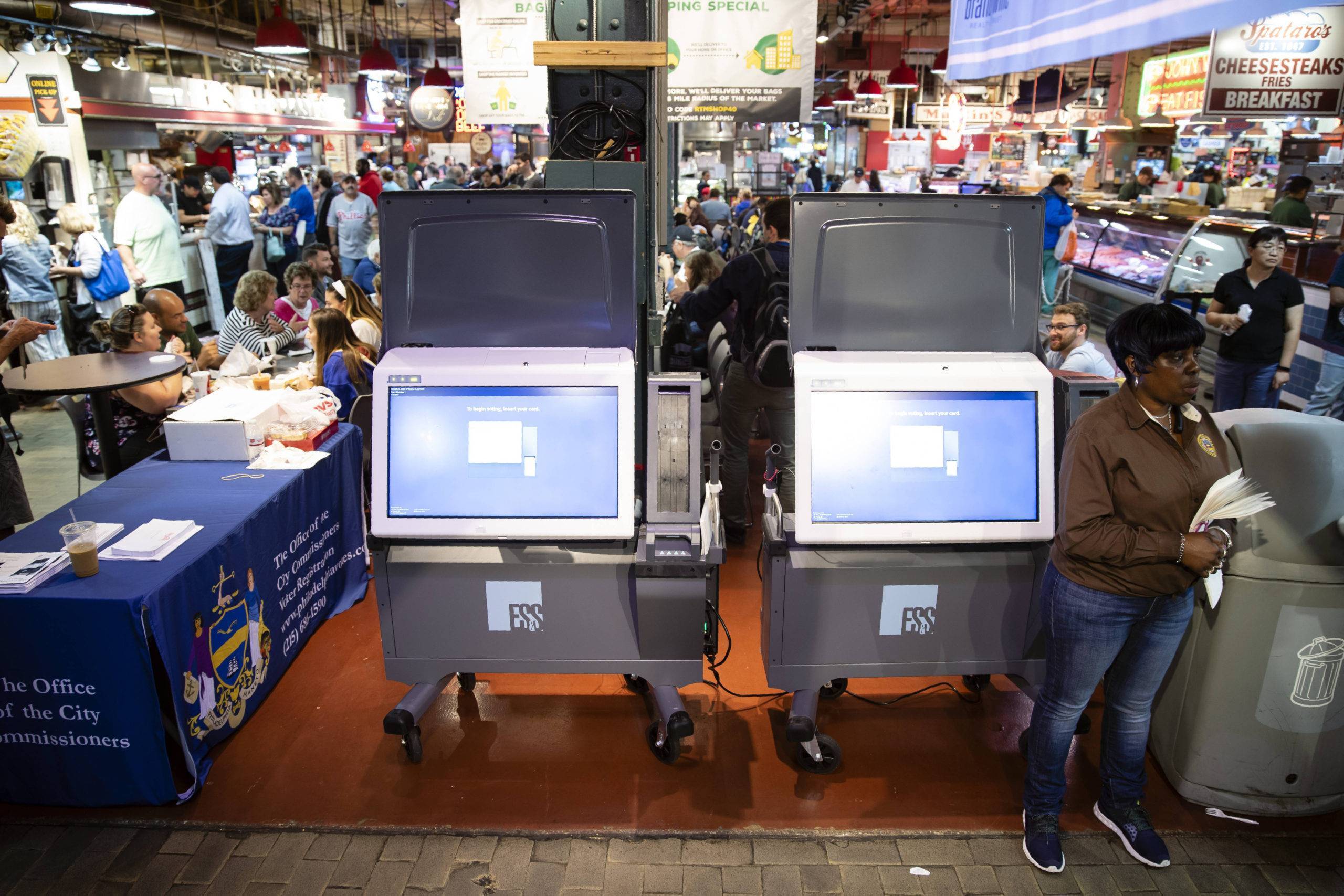 FILE - In this June 13, 2019, file photo, ExpressVote XL voting machines are displayed during a demonstration at the Reading Terminal Market in Philadelphia. More than one in ten voters could vote on paperless voting machines in the 2020 general election, according to a new analysis, leaving their ballots vulnerable to hacking according to a new study. (AP Photo/Matt Rourke, File)/WX203/19225092098772/A JUNE 13, 2019, FILE PHOTO/1908131210