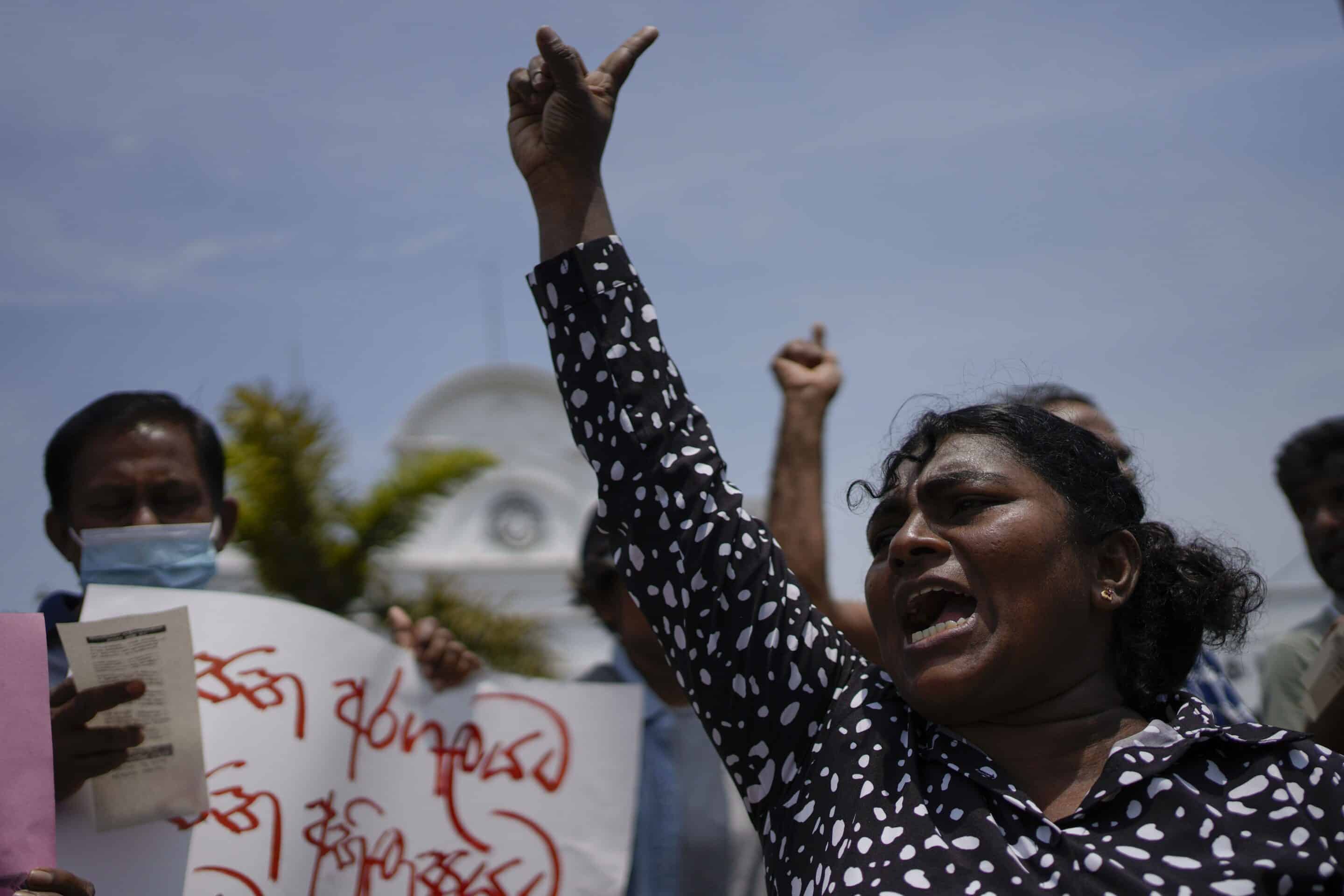 An anti government protester shouts slogans against the recent military eviction of their protest camp outside president's office in Colombo, Sri Lanka, Wednesday, July 27, 2022. (AP Photo/Eranga Jayawardena)/EJX103/22208448246560//2207271434