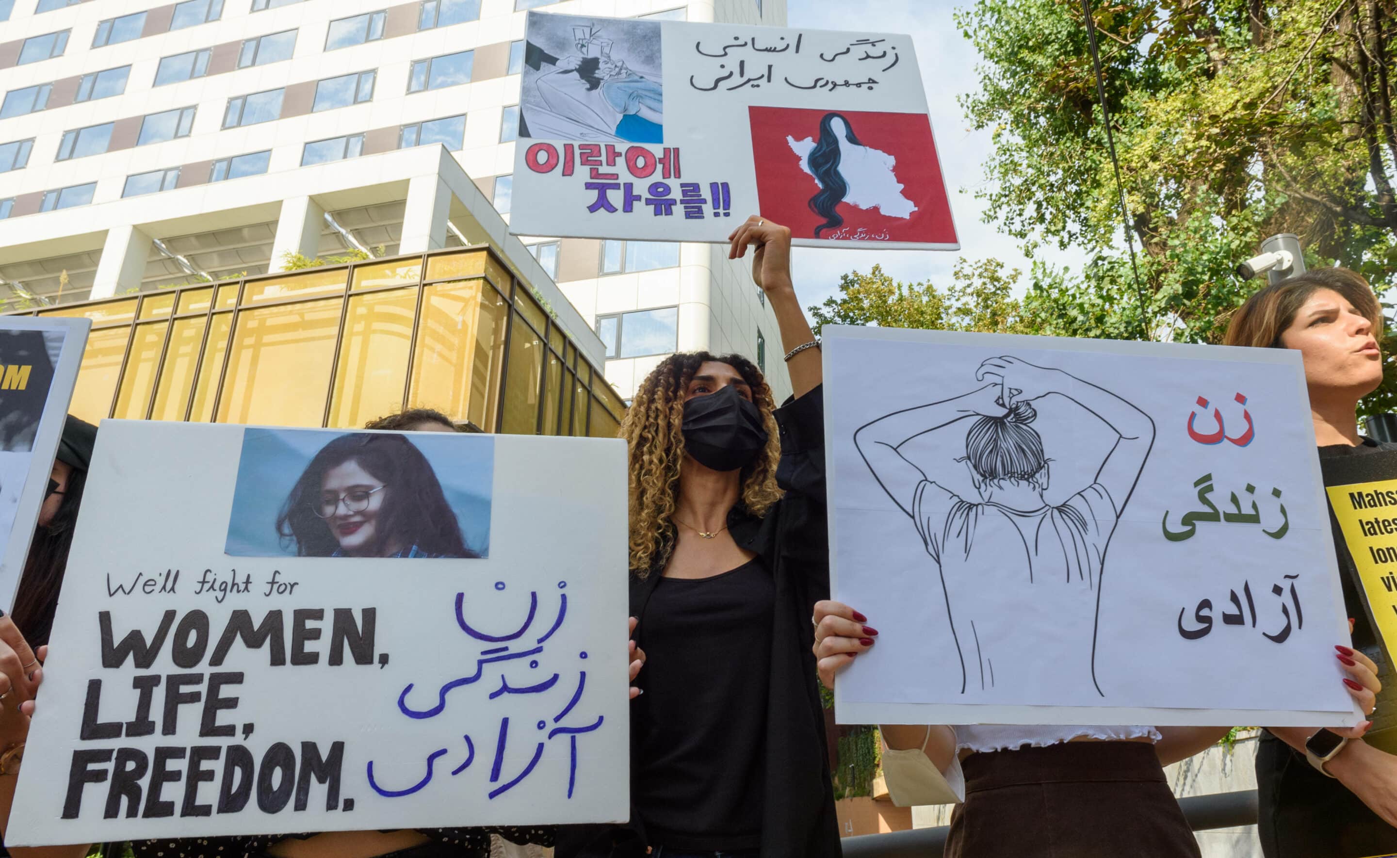 Iranian protesters hold placards expressing their opinion during a rally against the death of Iranian Mahsa Amini outside the  Embassy of the Islamic Republic of Iran in Seoul. Iranian protesters staged a rally criticizing the Iranian government's strong crackdown on local protests involving the sudden death of Mahsa Amini, who had been arrested in Tehran for allegedly violating the strict law requiring women to cover their hair with a hijab, or headscarf, earlier this month. - Kim Jae-Hwan / SOPA Images//SOPAIMAGES_sopa0155/2209281714/Credit:SOPA Images/SIPA/2209281722