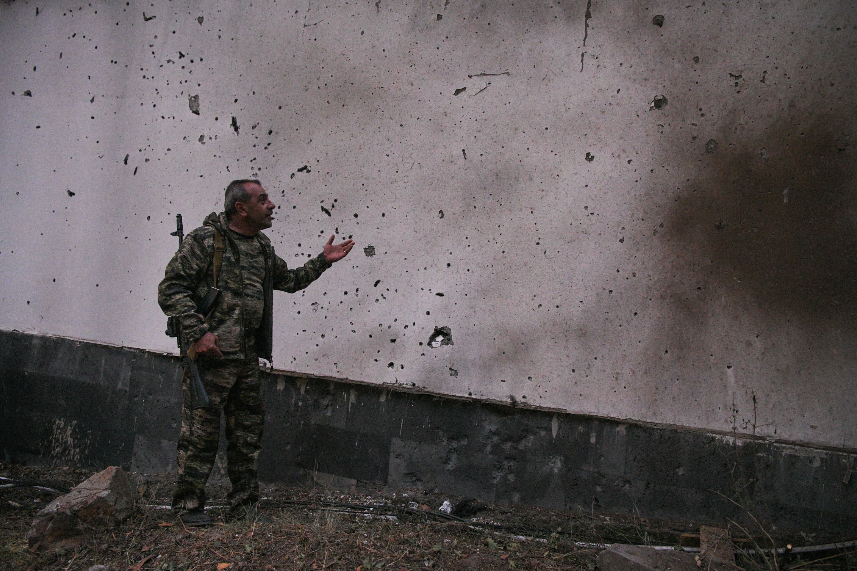A cableway director shows a wall of an administrative building damaged in a shelling attack. Alexander Patrin/TASS/Sipa USA/41537701/AK/2209152052