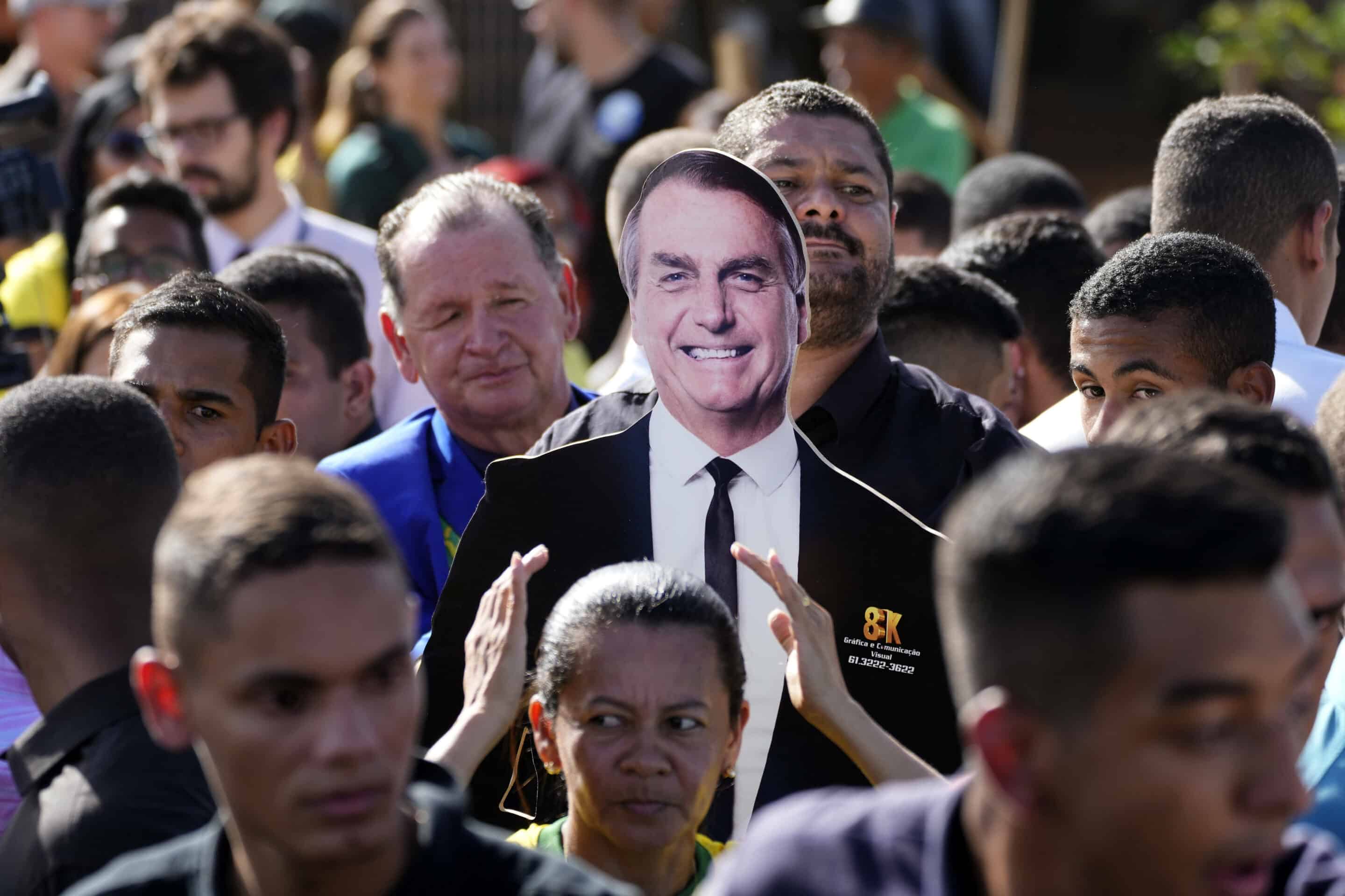 Supporters carry a life-size image of Brazil's President Jair Bolsonaro during a campaign rally in the rural workers' settlement Nova Jerusalem, or New Jerusalem, in Brasilia, Brazil, Monday, Oct. 24, 2022. Bolsonaro is running for reelection in the presidential runoff election set for Oct. 30. (AP Photo/Eraldo Peres)/XEP115/22297755282079//2210242306