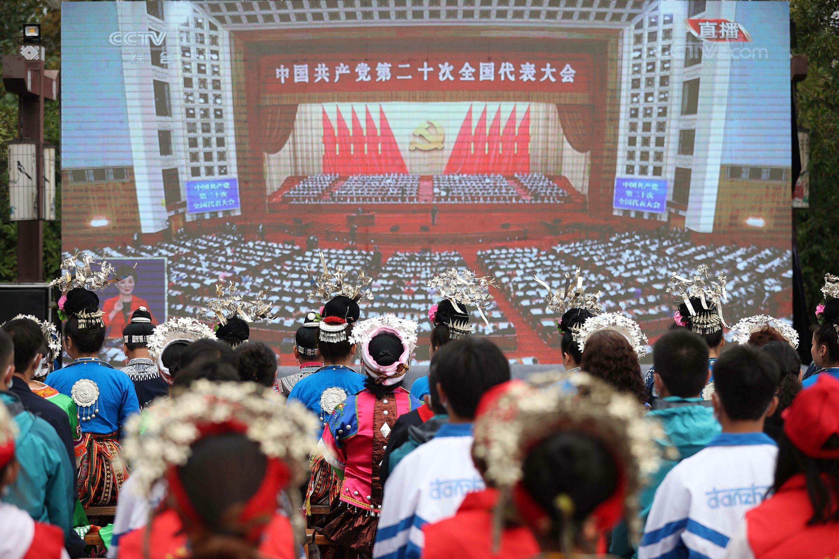QIANDONGNAN, CHINA - OCTOBER 16, 2022 - Villagers of Miao ethnic group watch the opening ceremony of the 20th National Congress of the Communist Party of China in Qiandongnan Miao and Dong autonomous prefecture, Guizhou Province, China, Oct 16, 2022. (Photo by CFOTO/Sipa USA)/42126051//2210161057