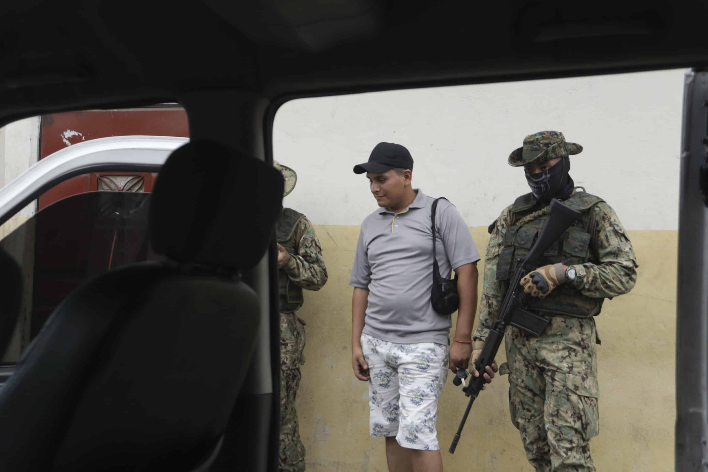 Soldiers check a car looking for weapons during a military operation in Guayaquil, Ecuador, Thursday, Jan. 18, 2024.  (AP Photo/Cesar Munoz)/DOR103/24018776718098//2401182255
