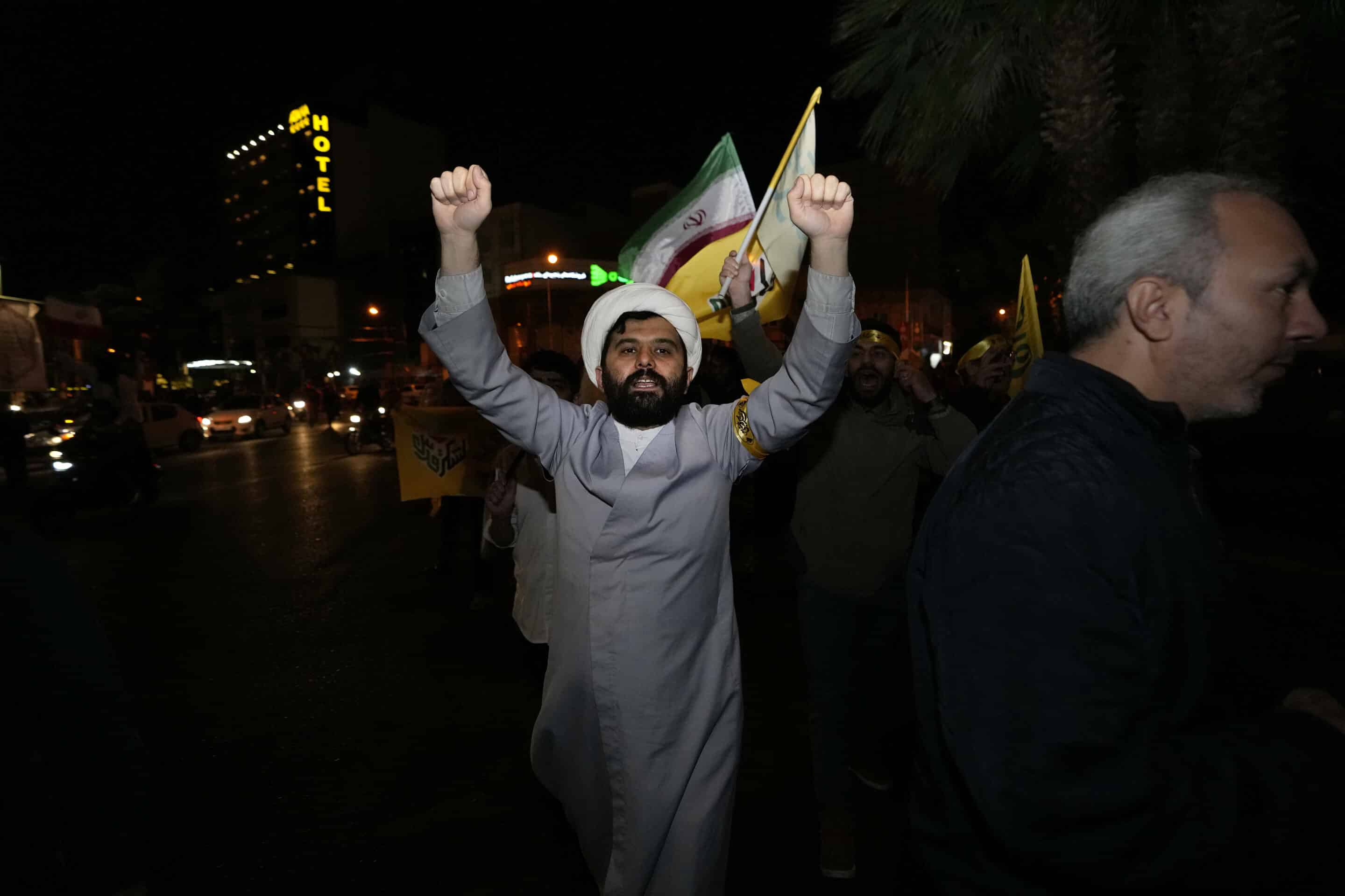 An Iranian cleric chants slogans while attending an anti-Israeli gathering at the Felestin (Palestine) Square in Tehran, Iran, early Sunday, April 14, 2024. (AP Photo/Vahid Salemi)/VAH103/24104810138558//2404140038